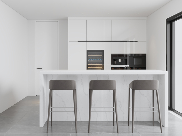 Project case image for the Banana Island residential project in Nigeria. The image showcases a modern one-wall kitchen with white cabinetry and a central island. The design features sleek, contemporary finishes and high-quality materials, creating a bright and functional cooking space. The central island adds both style and practicality, offering additional counter space and enhancing the overall aesthetic of the kitchen.