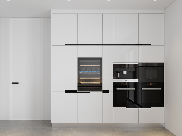 Project case image for the Banana Island residential project in Nigeria. The image features a sleek one-wall kitchen with white cabinetry, modern appliances, and minimalist design. The bright and airy space highlights clean lines, high-quality finishes, and a contemporary aesthetic, creating a functional and elegant cooking area within the residence.