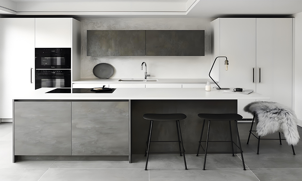 A one-wall kitchen featuring a modern black, white, and gray color scheme for the cabinetry, complemented by a central island. The contrasting tones of black, white, and gray create a sophisticated, contemporary look, while the island adds both functionality and a stylish focal point to the space.