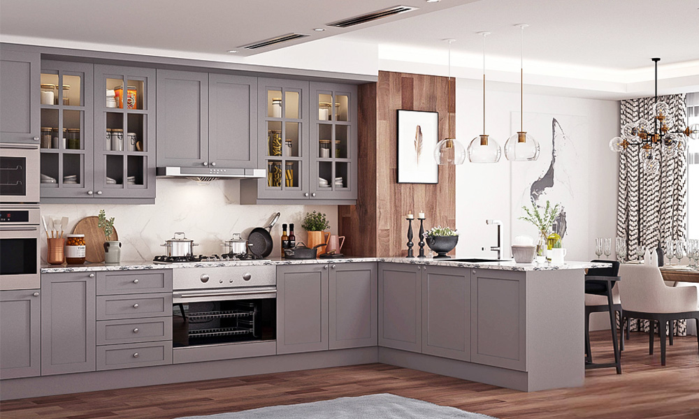 An L-shaped kitchen featuring gray cabinetry, offering a modern and sophisticated aesthetic. The design is sleek and minimalist, with clean lines and ample storage space. The gray tones provide a neutral backdrop, creating a balanced and elegant atmosphere in the kitchen. The layout ensures a functional workspace, perfect for both cooking and entertaining.
