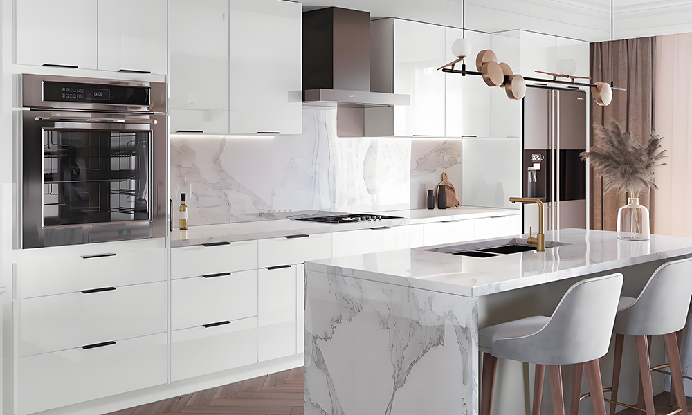 A contemporary kitchen featuring white cabinetry and a marble central island. The crisp white cabinets enhance the bright, airy atmosphere, while the marble island adds a luxurious and sophisticated touch, serving as both a functional workspace and a focal point in the design.