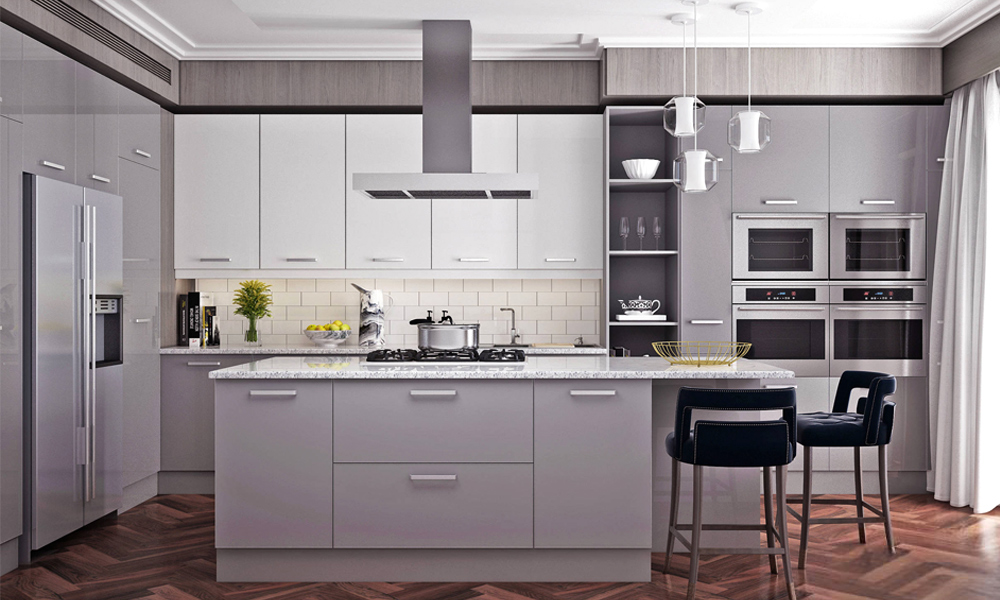 A modern L-shaped kitchen featuring gray cabinetry, elegant marble countertops, and a central island. The sophisticated gray tones paired with the marble surfaces create a contemporary and stylish atmosphere, combining functionality with refined design for an inviting cooking space.
