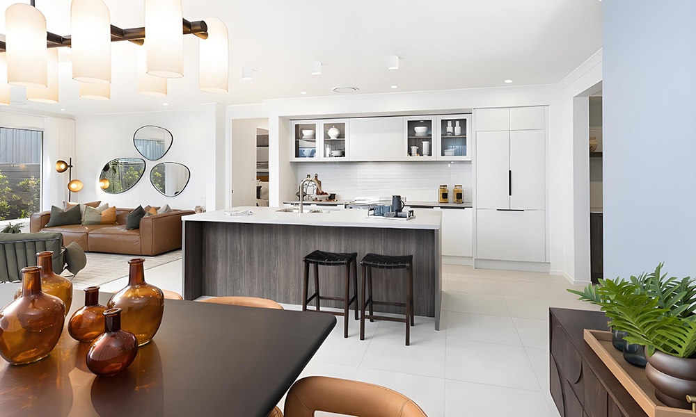A modern one-wall kitchen with sleek white lacquer cabinets and a wood veneer central island. The clean lines, glossy white surfaces, and warm wood texture of the island create a balanced and contemporary aesthetic, enhancing both the style and functionality of the kitchen space.