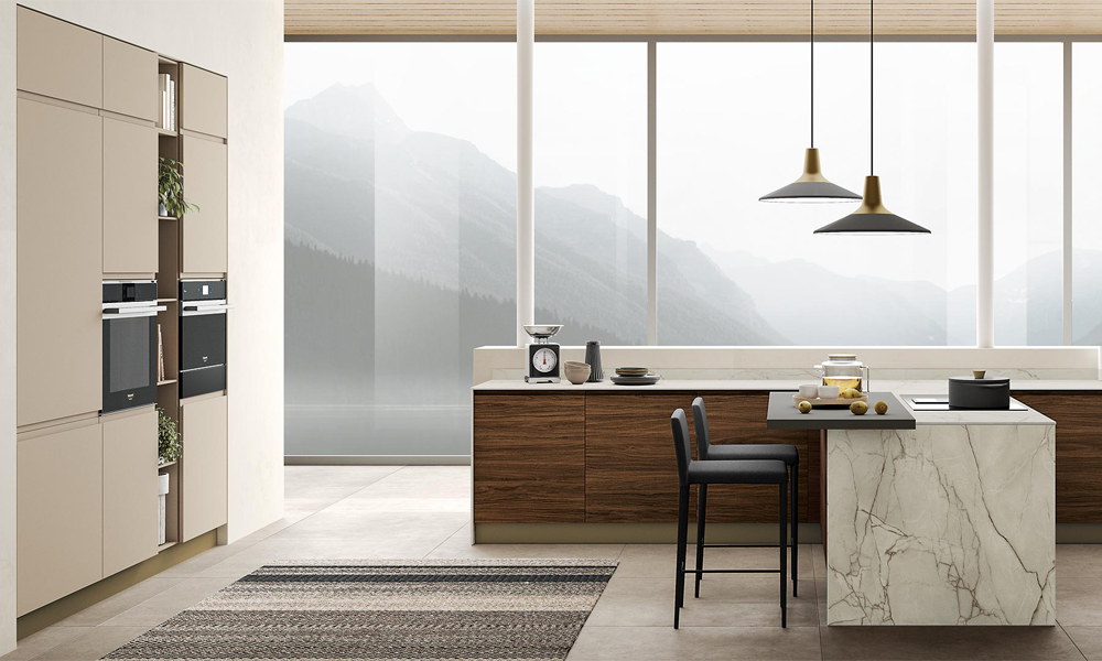A close-up view of a modern L-shaped kitchen showcasing wood veneer base cabinets, gray lacquer upper cabinets, and a marble countertop. The central island, also topped with marble, adds a touch of elegance and functionality. The combination of natural wood textures, smooth gray lacquer, and luxurious marble creates a refined, contemporary look.