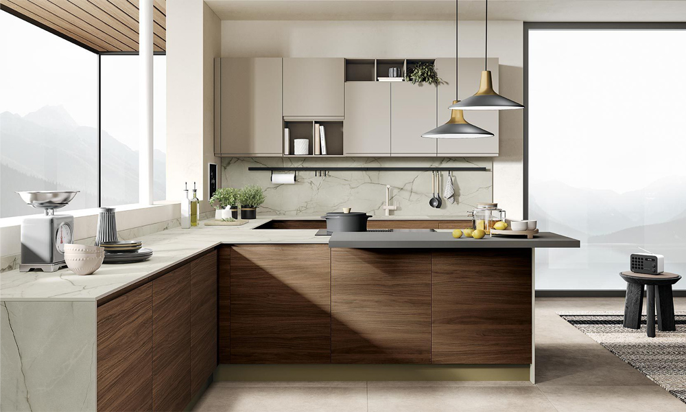 A close-up view of an L-shaped kitchen featuring light wood veneer cabinets with a white countertop. The soft, natural tones of the light wood contrast beautifully with the clean, bright surface of the white countertop, creating a serene and modern atmosphere. The image showcases the seamless integration of the cabinetry, highlighting the fine grain pattern of the wood and the sleek lines of the L-shaped design.