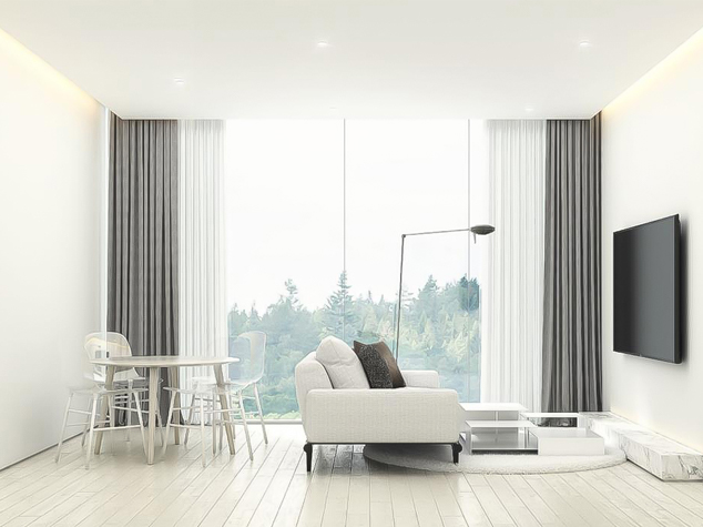 Project case image for an apartment project in Thailand. The living room display features a modern and elegant design with comfortable seating, contemporary furniture, and stylish decor. The space is bright and inviting, combining neutral tones and sleek finishes to create a warm and sophisticated atmosphere.