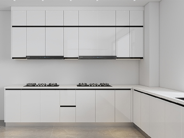 Project case image for the Banana Island residential project in Nigeria. The image features a stylish L-shaped kitchen with white cabinetry, sleek countertops, and modern appliances. The design emphasizes a clean, minimalist aesthetic with efficient use of space, creating a bright and functional cooking area that seamlessly blends style and practicality.