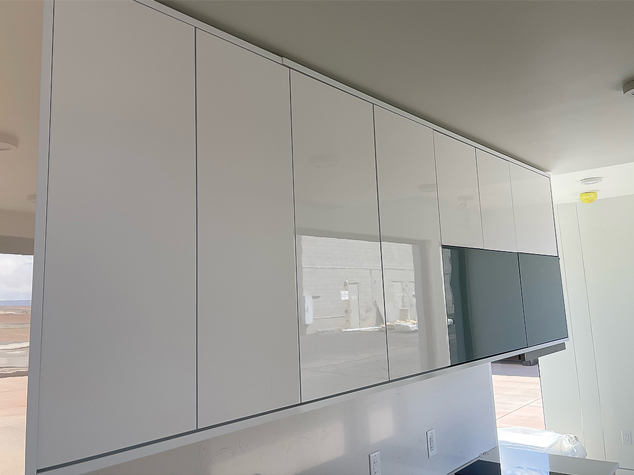 Project case image for the ZenniHome construction project in the United States. The image features a close-up view of modern cabinetry, highlighting sleek finishes, clean lines, and precise craftsmanship. The design emphasizes quality materials and contemporary aesthetics, showcasing the attention to detail in the project’s interior elements.