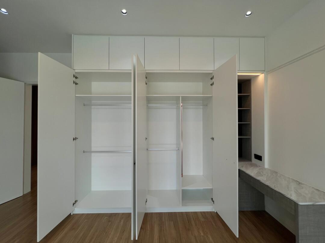 Sleek white melamine wardrobe featuring durable melamine finish and elegant design.