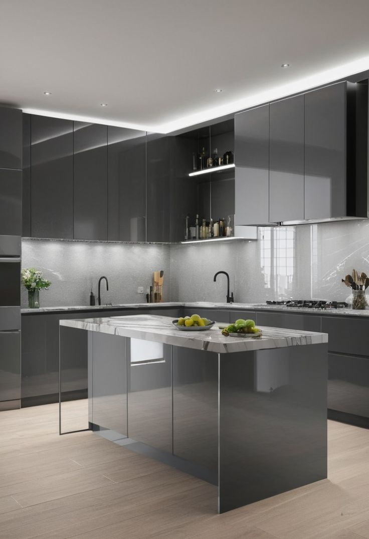 Compact apartment design featuring glossy grey kitchen cabinets paired with stainless steel appliances for a contemporary look.