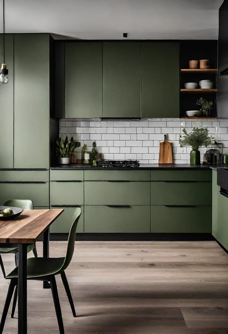 Green kitchen cabinets design with terrazzo worktops and slim chrome bar handles