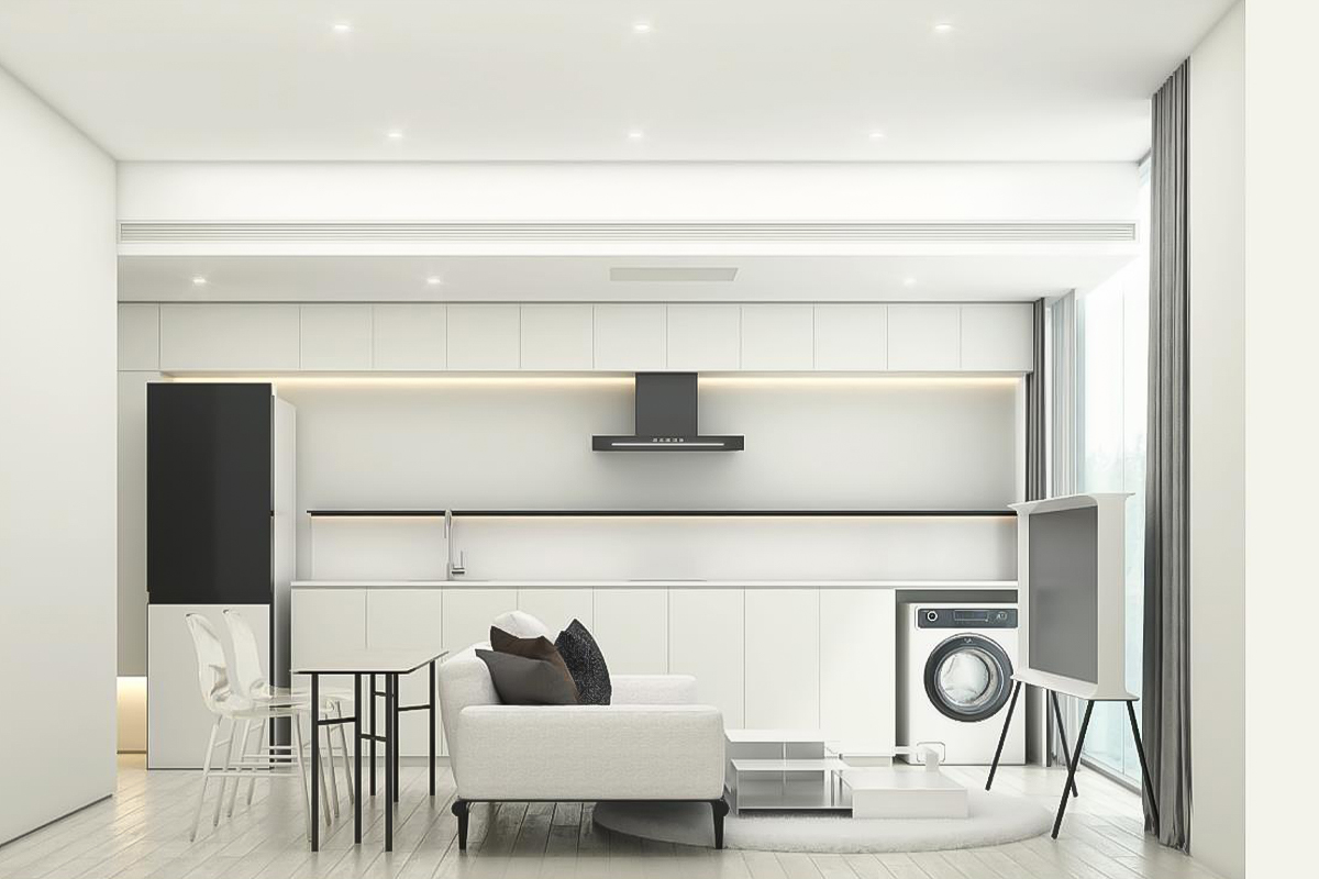 Alt text: “Warm mushroom beige kitchen cabinets with brass handles in modern UK kitchen.”