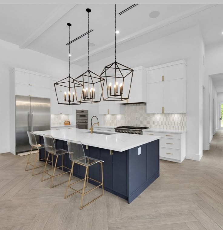 Two-tone White Kitchen Cabinet with navy blue island
